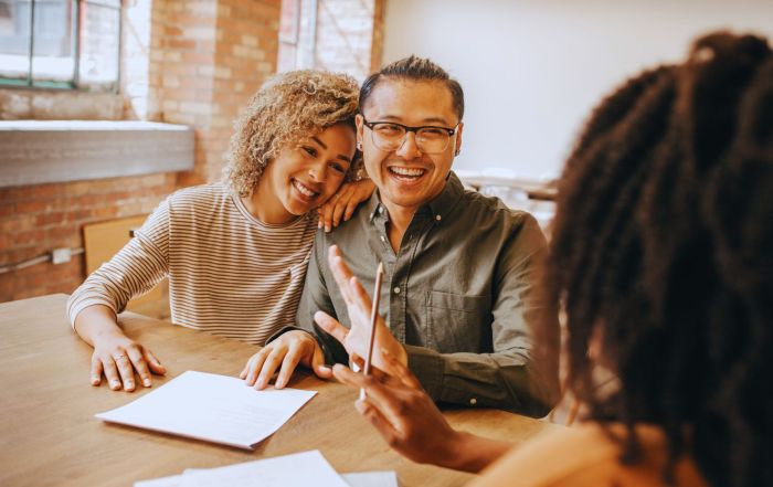 A couple talking about How Long Does Mortgage Approval Take After Pre-Approval